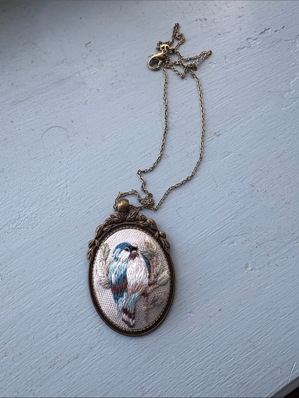 Embroidered Bird Pendant Necklace in Blue and Cream